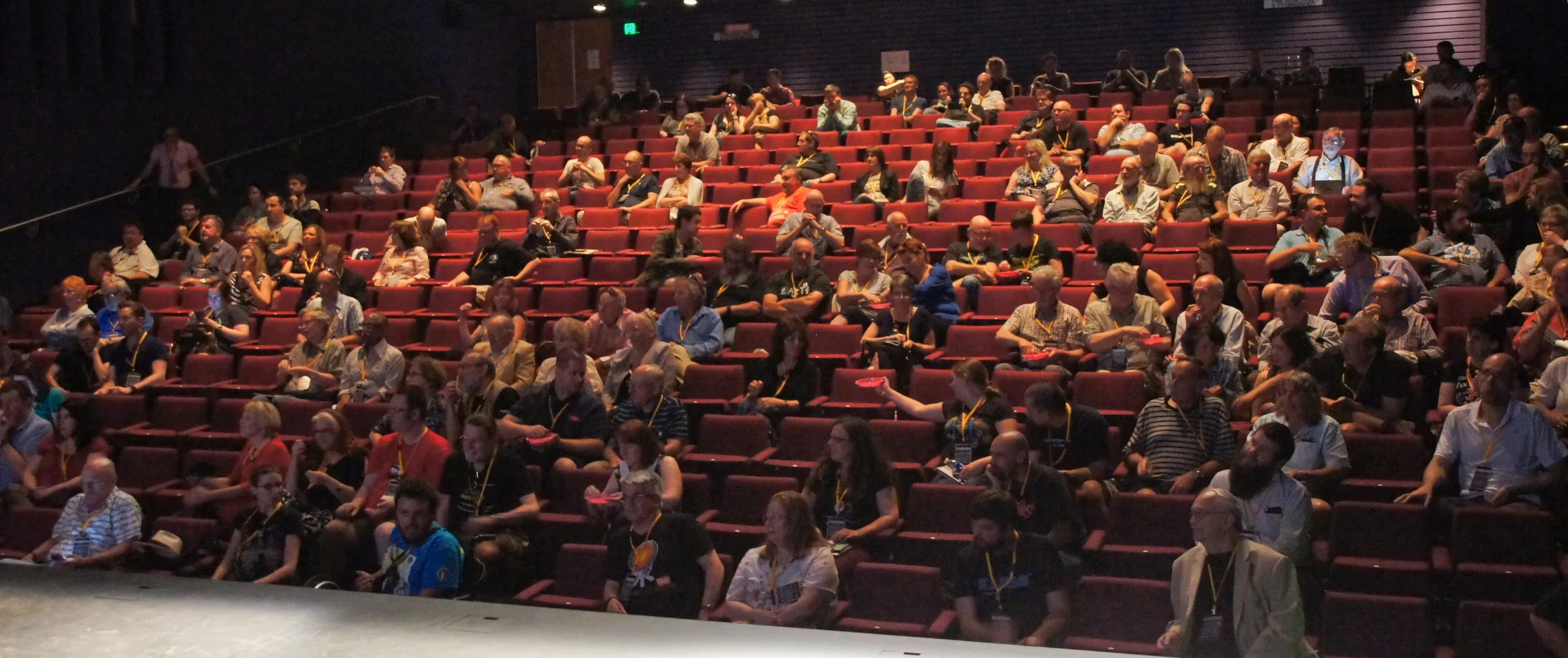 Audience seated in a cinema before a screening