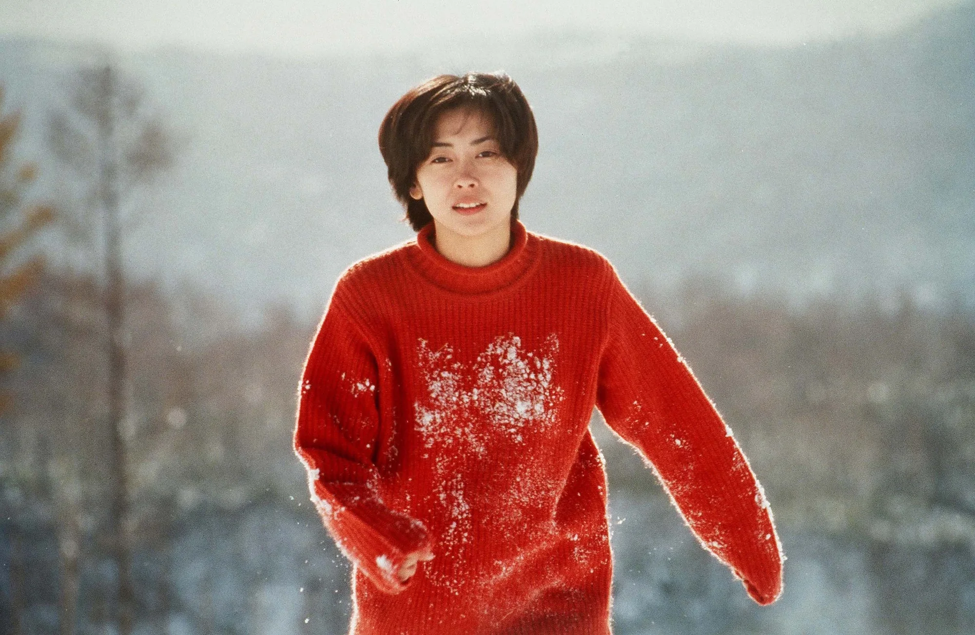 Promotional still of Hiroko in the snow from Love Letter